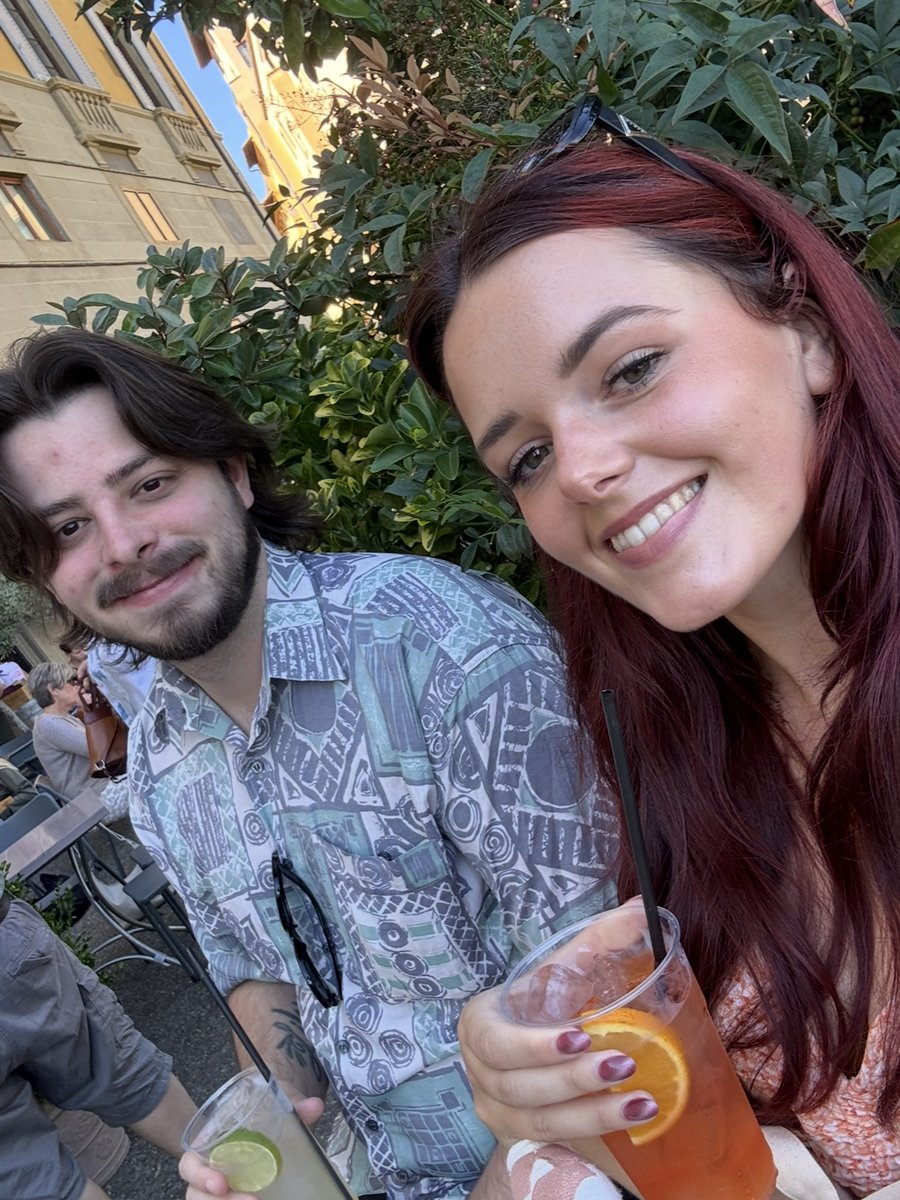 Chara and Kieran with drinks in the sunshine